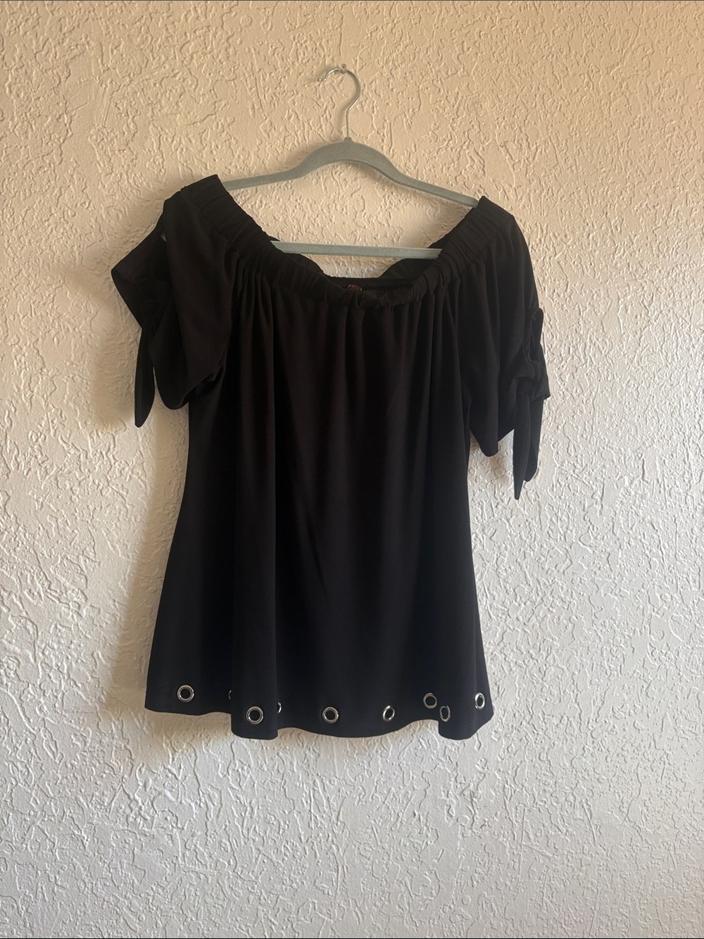 Belldini Black Off-Shoulder Top with Grommet Hem